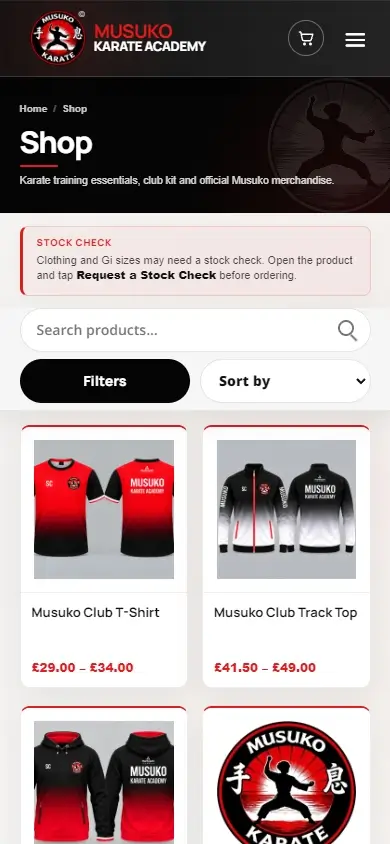 Genuine Musuko Karate Academy mobile shop showing responsive stock check messaging, search, filters, sorting and clubwear product cards.